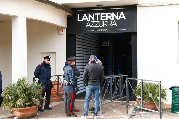 Carabinieri officers stand in front of the disco 'Lanterna Azzurra' in Corinaldo, central Italy, central Italy, 08 December 2018. At least Six people, all but one of them minors, were killed and about 35 others injured in a stampede of panicked concertgoers early Saturday at a disco in a small town on Italy's central Adriatic coast.